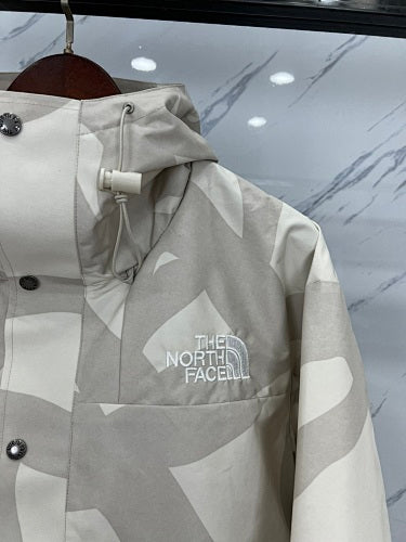The North Face × KAWS DryVent Mountain Jacket Cream XX Allover Print
