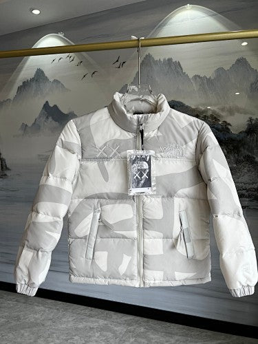 The North Face × KAWS Nuptse Down Jacket Cream XX Allover Print